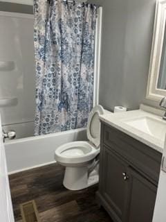 full bathroom with toilet, shower / bath combination with curtain, wood-type flooring, and vanity