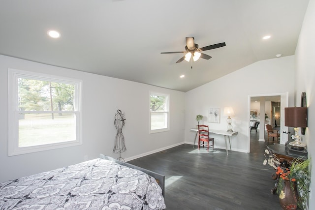 bedroom featuring vaulted ceiling, dark wood-type flooring, and ceiling fan