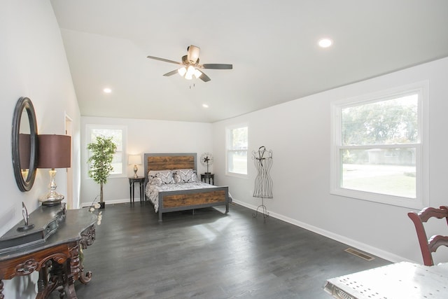 bedroom with dark wood-type flooring, ceiling fan, and vaulted ceiling