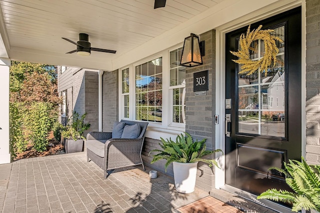 view of patio featuring ceiling fan