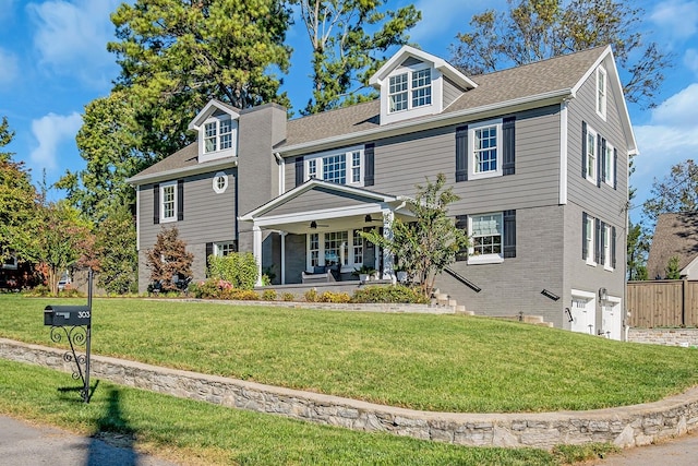 view of front of property with a front lawn and a porch