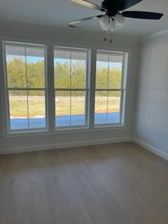 spare room with ceiling fan