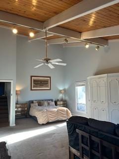 bedroom with wood ceiling, high vaulted ceiling, track lighting, beamed ceiling, and carpet