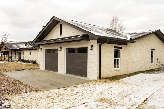 view of property exterior with a garage