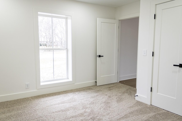 empty room featuring carpet floors