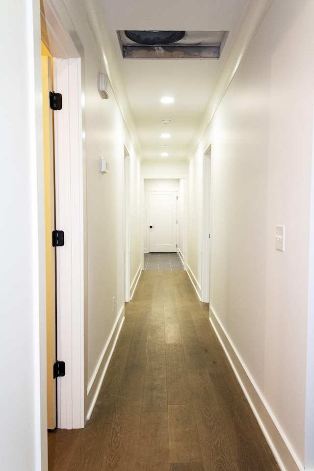 hallway featuring dark hardwood / wood-style floors