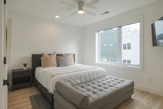 bedroom featuring ceiling fan and light wood-type flooring