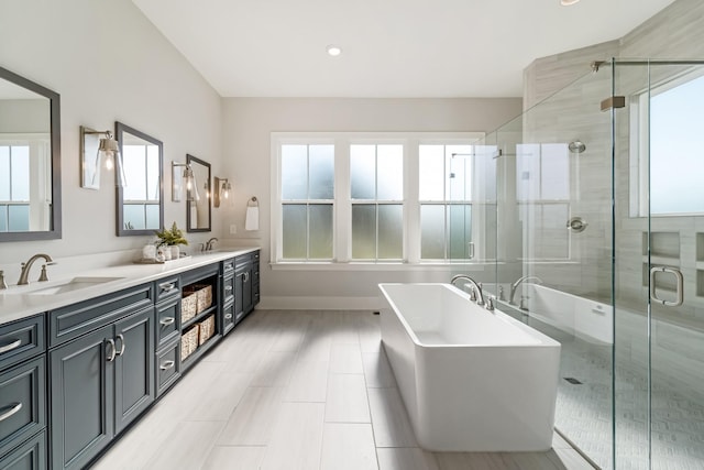 bathroom with vanity and plus walk in shower