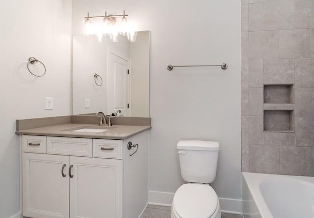 bathroom with toilet and vanity