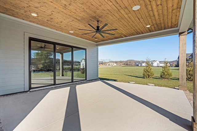 view of patio featuring ceiling fan