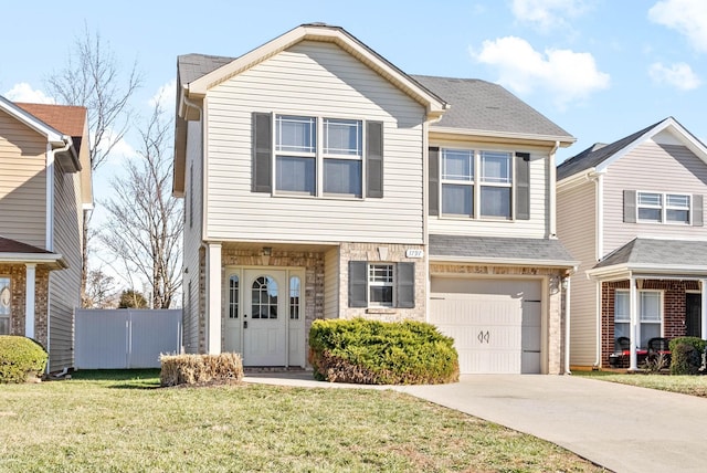 front of property featuring a garage and a front yard