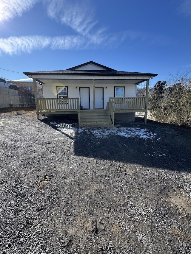 view of front of property featuring covered porch