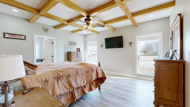 bedroom with ceiling fan, light wood-type flooring, beamed ceiling, and coffered ceiling