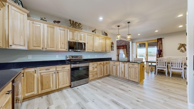 kitchen with decorative light fixtures, kitchen peninsula, light wood-type flooring, light brown cabinets, and stainless steel appliances