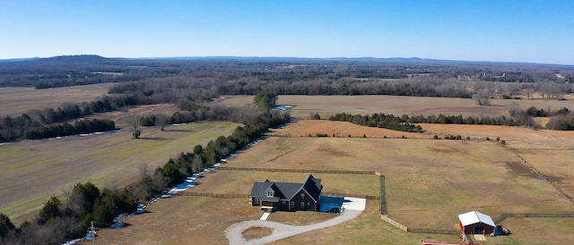 birds eye view of property featuring a rural view