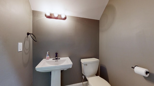 bathroom featuring toilet