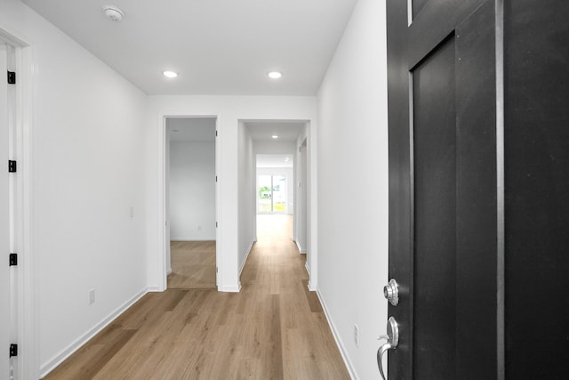 hallway featuring light hardwood / wood-style flooring