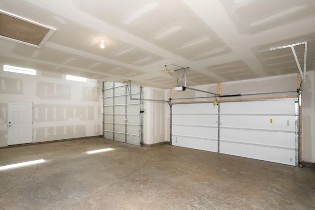 garage featuring a garage door opener