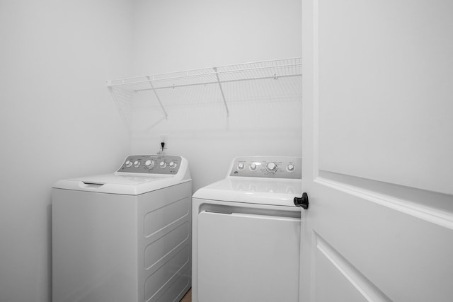 laundry room featuring independent washer and dryer