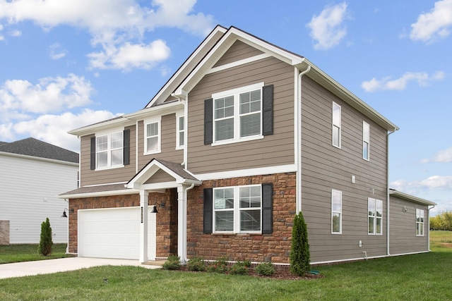 view of front of house featuring a garage and a front yard