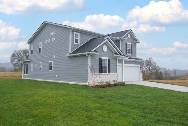 view of side of home featuring a yard and a garage