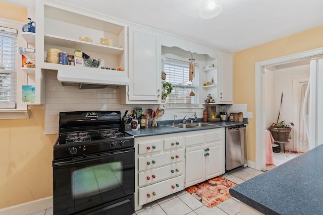 kitchen with sink, white refrigerator, gas stove, white cabinets, and stainless steel dishwasher