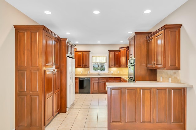 kitchen with kitchen peninsula, backsplash, dishwasher, white refrigerator with ice dispenser, and sink