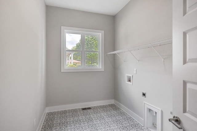 clothes washing area featuring electric dryer hookup and hookup for a washing machine