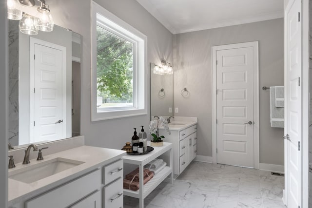 bathroom with vanity and crown molding