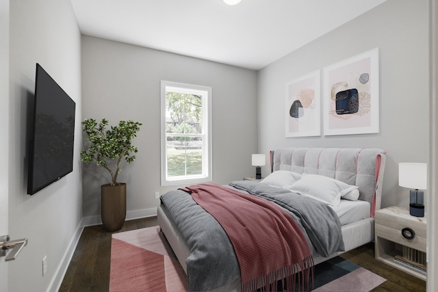 bedroom featuring dark hardwood / wood-style floors