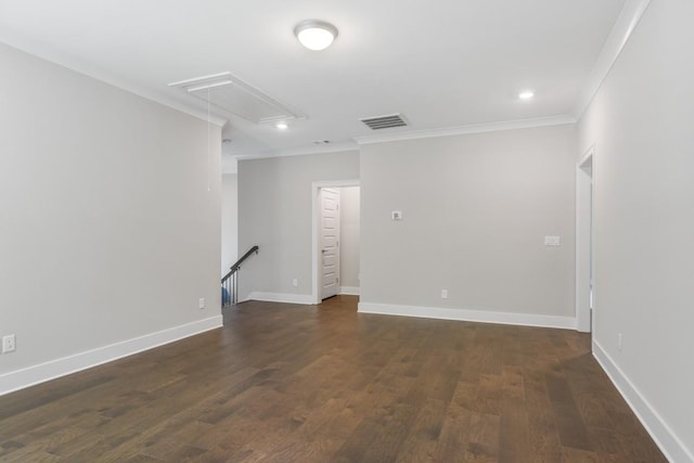 unfurnished room with dark wood-type flooring and ornamental molding