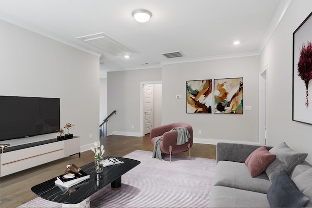 living room with hardwood / wood-style flooring and ornamental molding