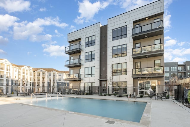 view of pool featuring a patio area