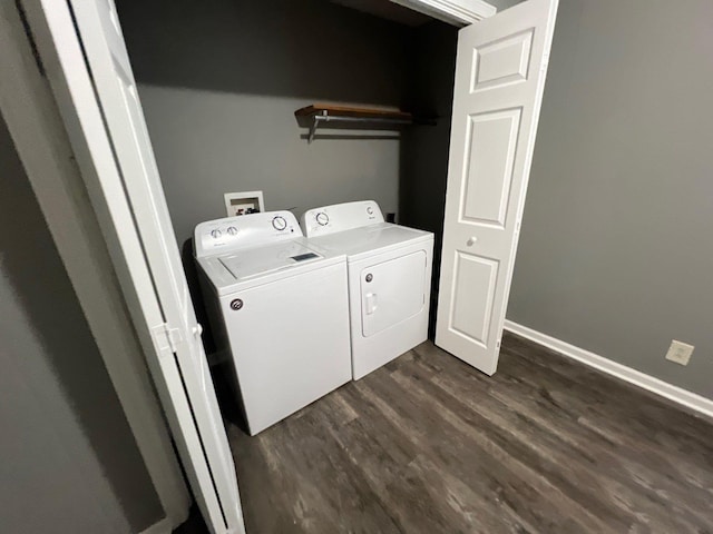 laundry area featuring independent washer and dryer and dark hardwood / wood-style floors