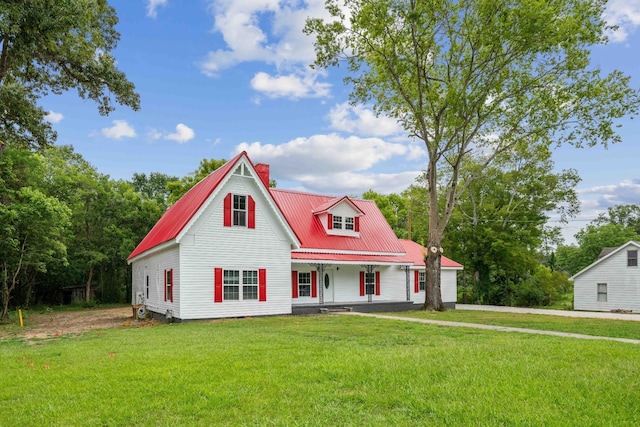 view of front of property featuring a front lawn and a porch