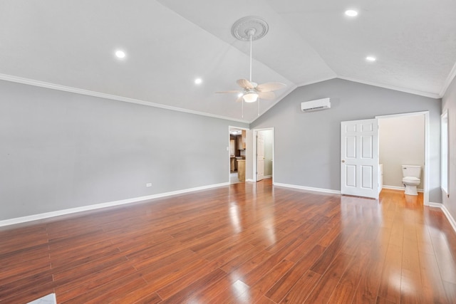 unfurnished living room with ceiling fan, ornamental molding, lofted ceiling, and hardwood / wood-style flooring