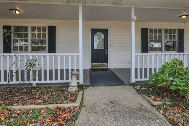 entrance to property with covered porch