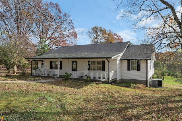 ranch-style house with a front yard, central AC, and a porch