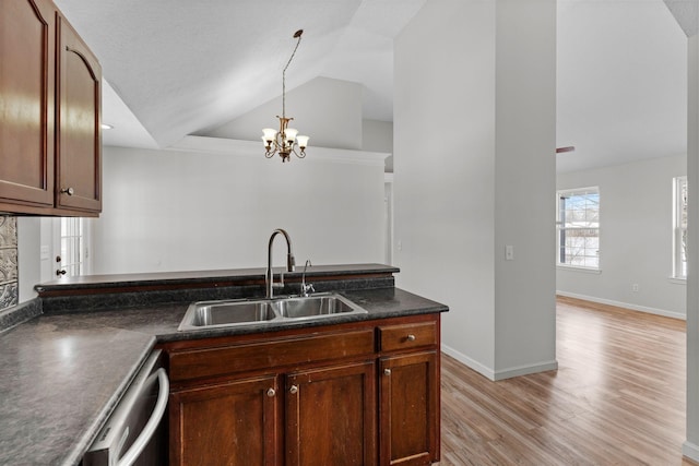 kitchen with lofted ceiling, sink, a chandelier, light wood-type flooring, and dishwashing machine