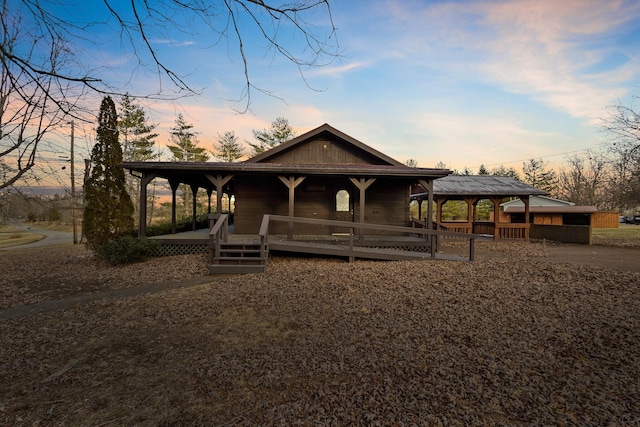 farmhouse featuring covered porch