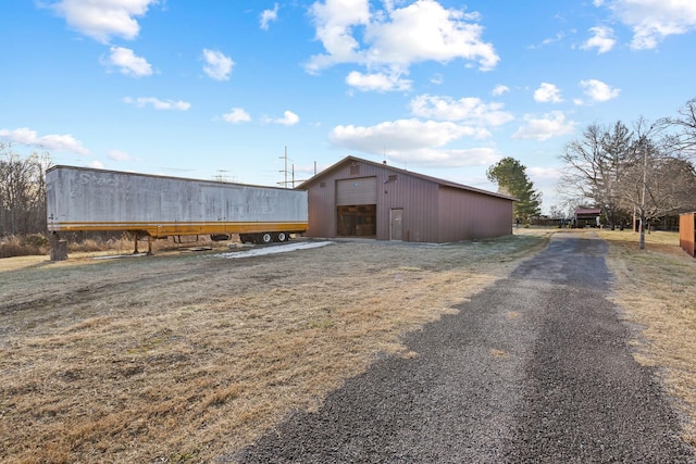 view of outdoor structure with a garage