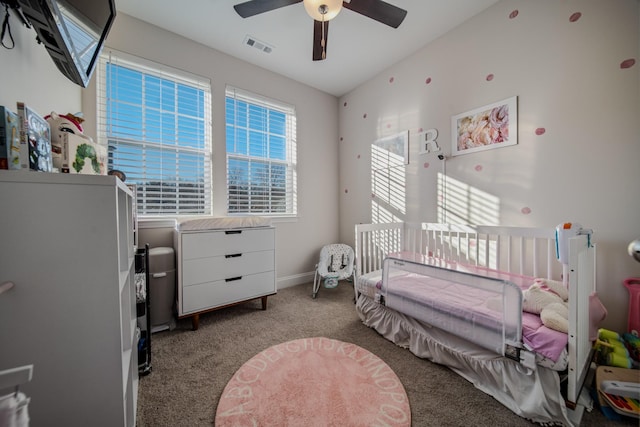 carpeted bedroom featuring ceiling fan