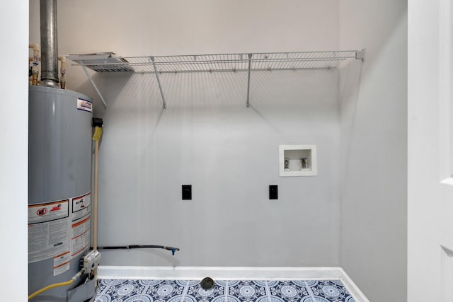 washroom featuring hookup for an electric dryer, hookup for a washing machine, and gas water heater