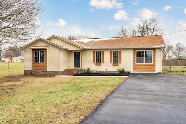 single story home with a front yard