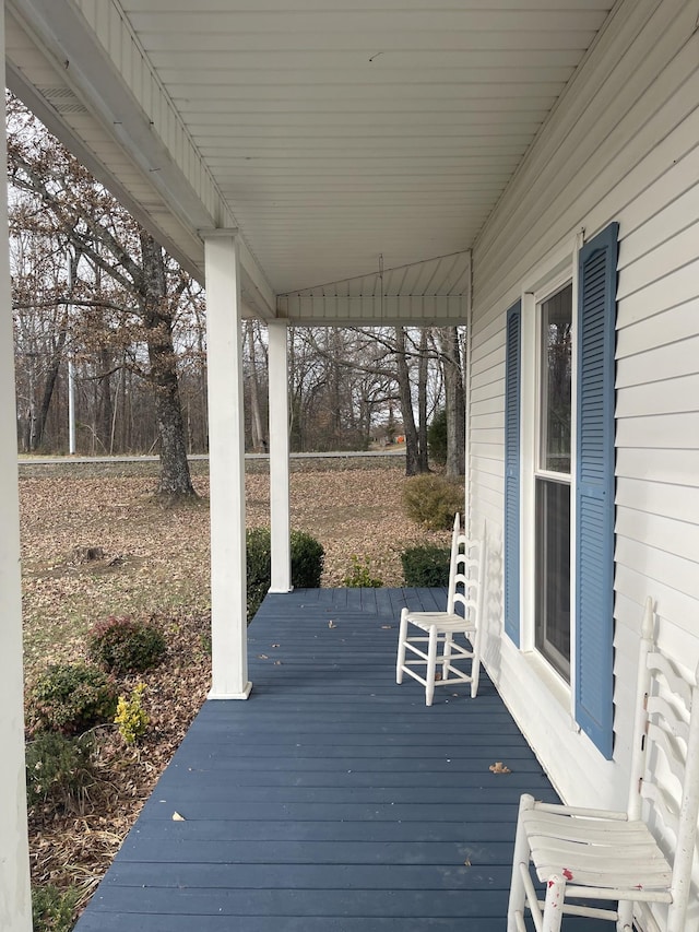 wooden deck featuring a porch