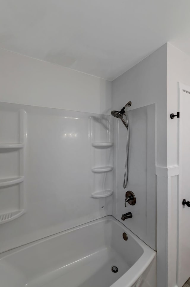 bathroom with shower / bathtub combination