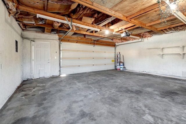 garage with a garage door opener and gas water heater