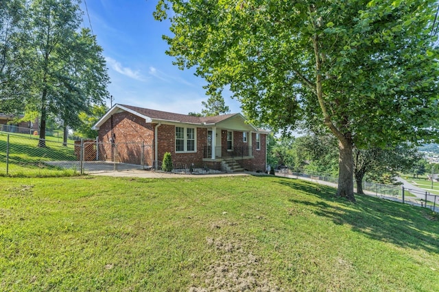 ranch-style house with a front lawn