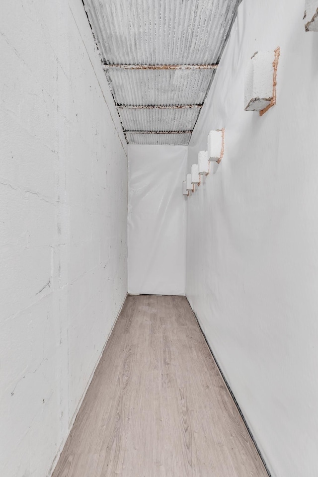 basement with light wood-type flooring