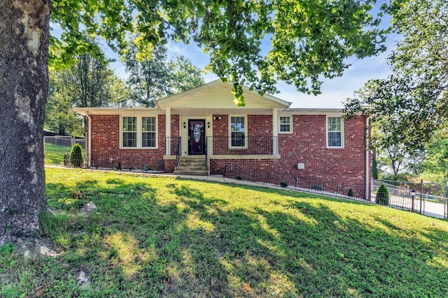 single story home featuring a front yard